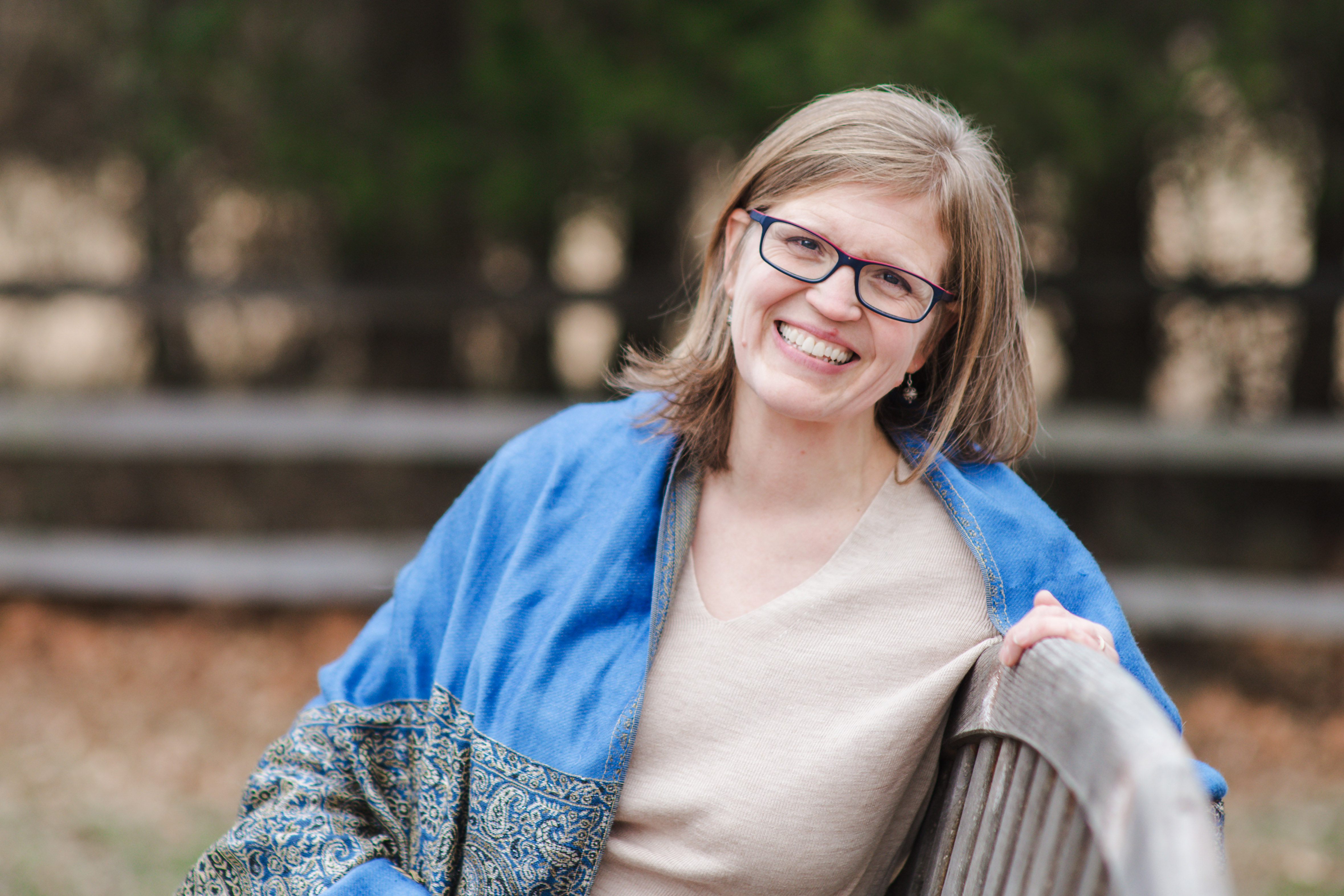 Laura Banks outdoors with a blue patterned shawl.